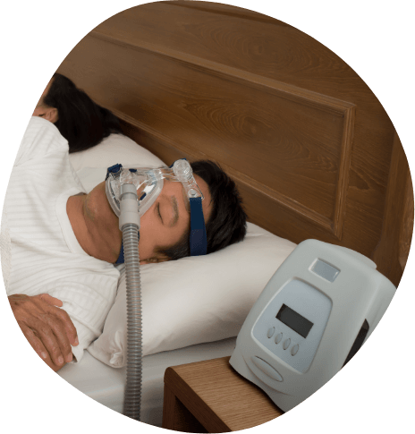 Sleeping man wearing a C P A P