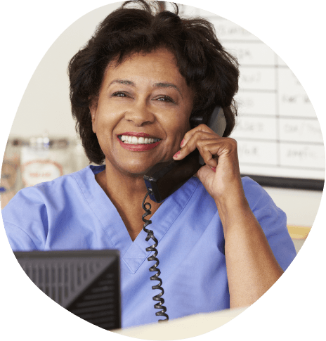 Woman smiling while talking on the phone