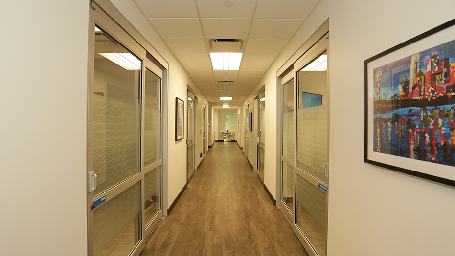 Hallway branching off into several rooms