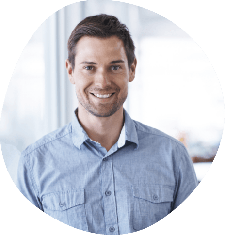 Smiling man in denim shirt