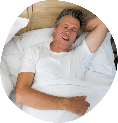 Older man sleeping with mouth open