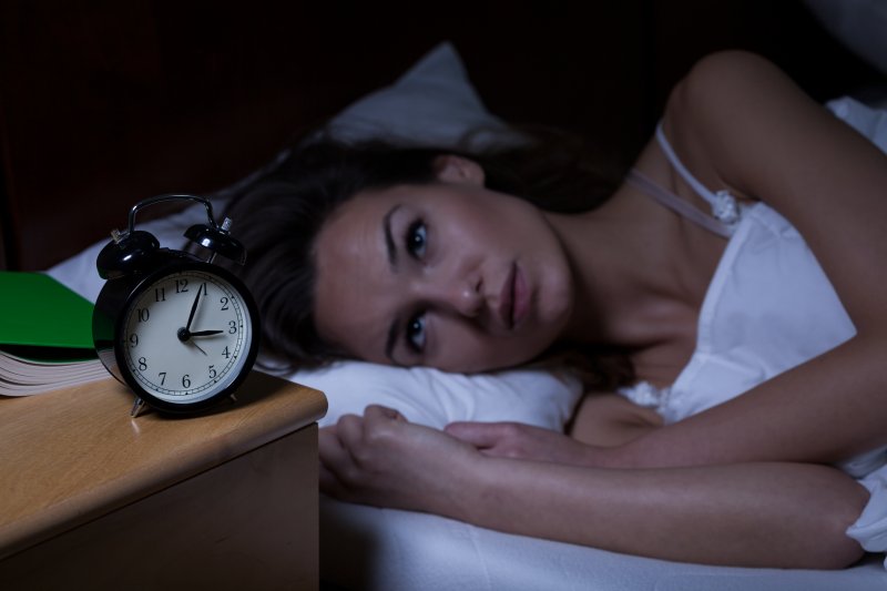 woman experiencing insomnia